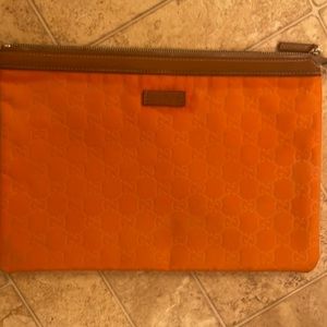 Orange Gucci cloth clutch-Approximately 12” x 8.50” x .25”